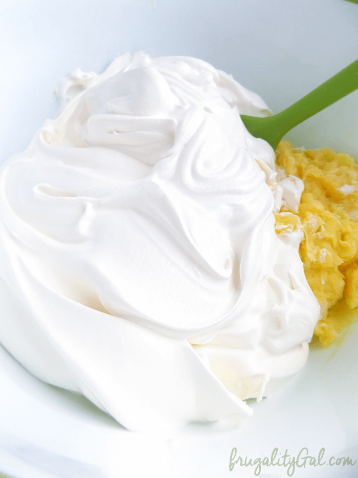 Cool whip and vanilla pudding in a bowl.