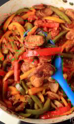 EASY 30 minute recipe for Sausage and Peppers Skillet. A quick, convenient and tasty one pot meal that will not disappoint!