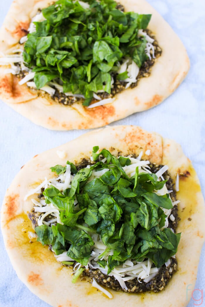 Naan bread with pizza toppings.