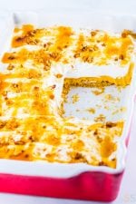 This pumpkin delight dessert recipe is an easy fall baking recipe to get in the fall spirit! This indulgent layered pumpkin dessert is sometimes also called a pumpkin lush dessert or a pumpkin lasagna dessert. It's an easy almost-no-bake dessert (just the crust is baked) that is super easy to make for a crowd!