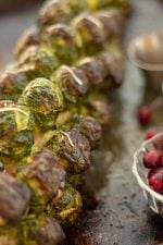 Parmesan Sprinkled on the Roast Brussel Sprout Stalks Resting on the Sheet Pan