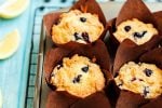 Muffin Liners Wrapped around the Blueberry Lemon Streusel Muffins