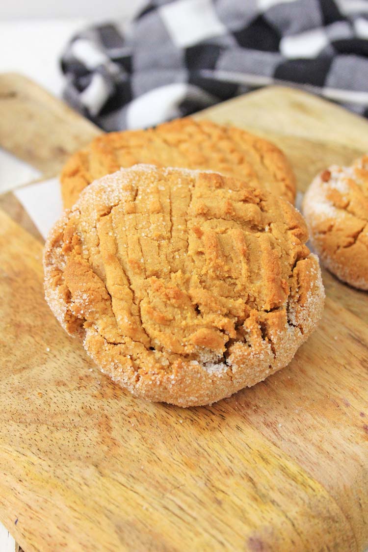 baked coconut flour peanut butter cookies on a cutting board.
