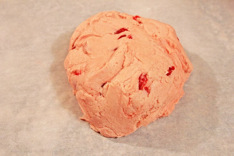 mixed batter on parchment paper ready for cooling in the refrigerator.