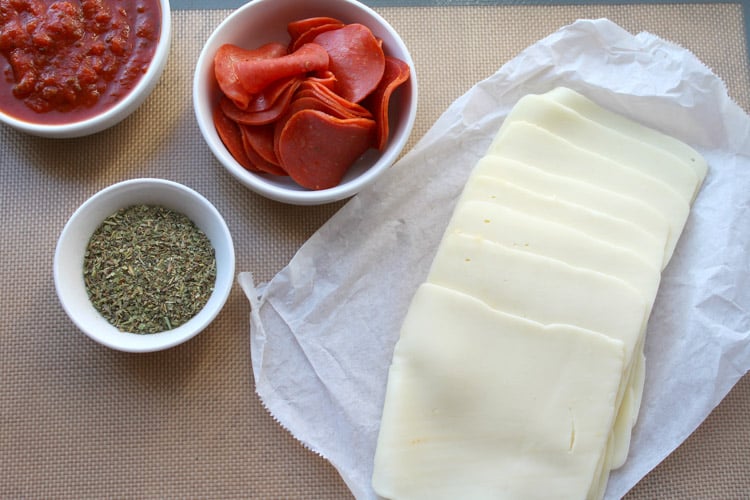 the ingredients for the easy keto pizza rolls and the optional dipping sauce.
