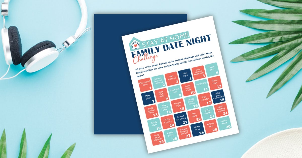 Free printable 30 day family date night challenge on a blue table next to greenery and headphones.
