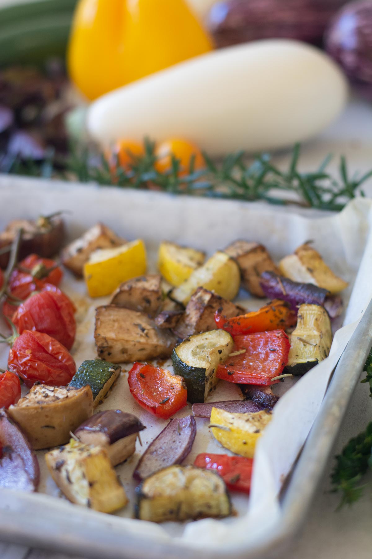 roasted Mediterranean veggies on the sheet pan.