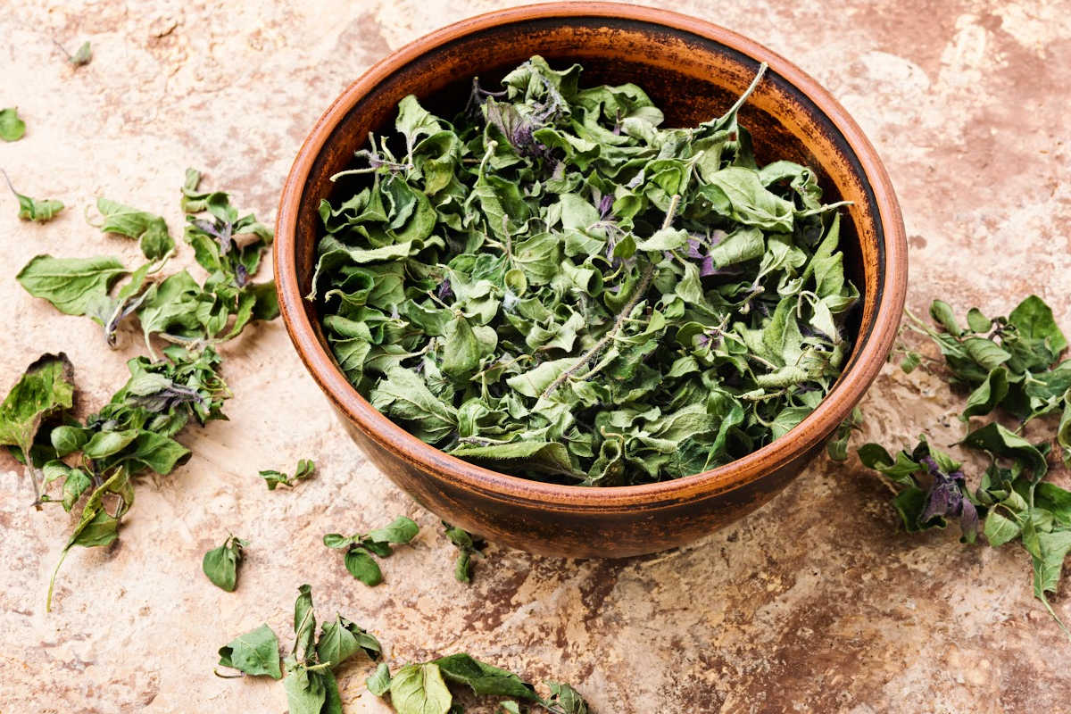 bowl of marjoram on a counter.