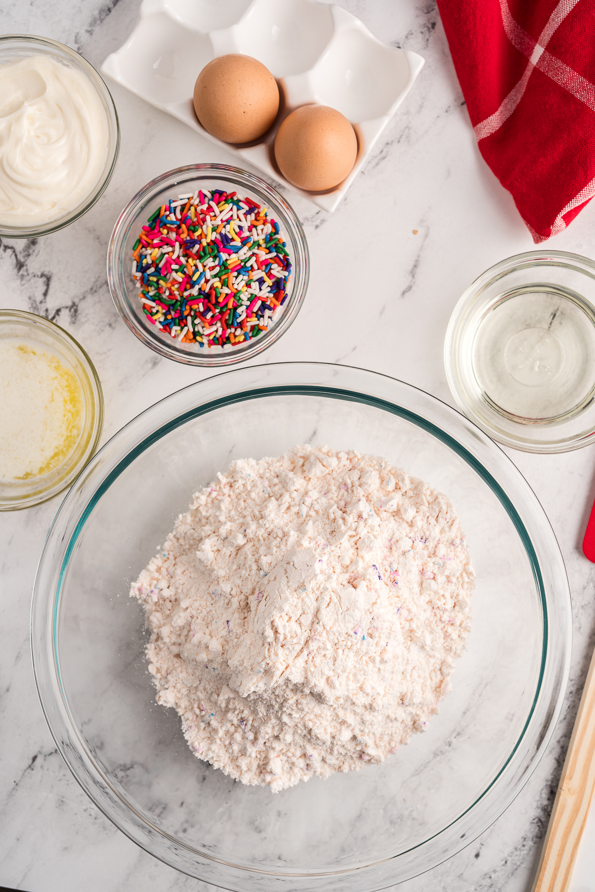 Top view of ingredients for funfetti cookies.