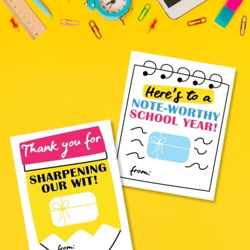 Top view of free printable back to school gift card holders for teachers and kids on yellow background next to alarm clock and school supplies.