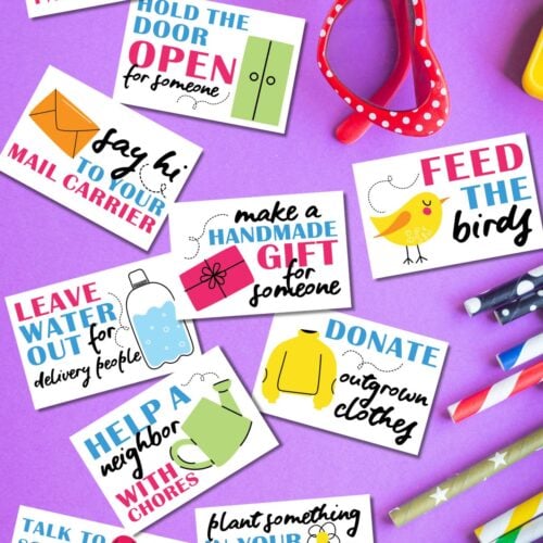 Free printable random acts of kindness cards for kids on purple background next to glasses and school supplies.
