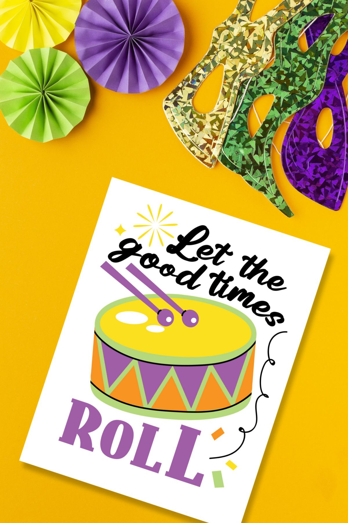 Free printable 'Let the good times roll' Mardi Gras sign on orange background.